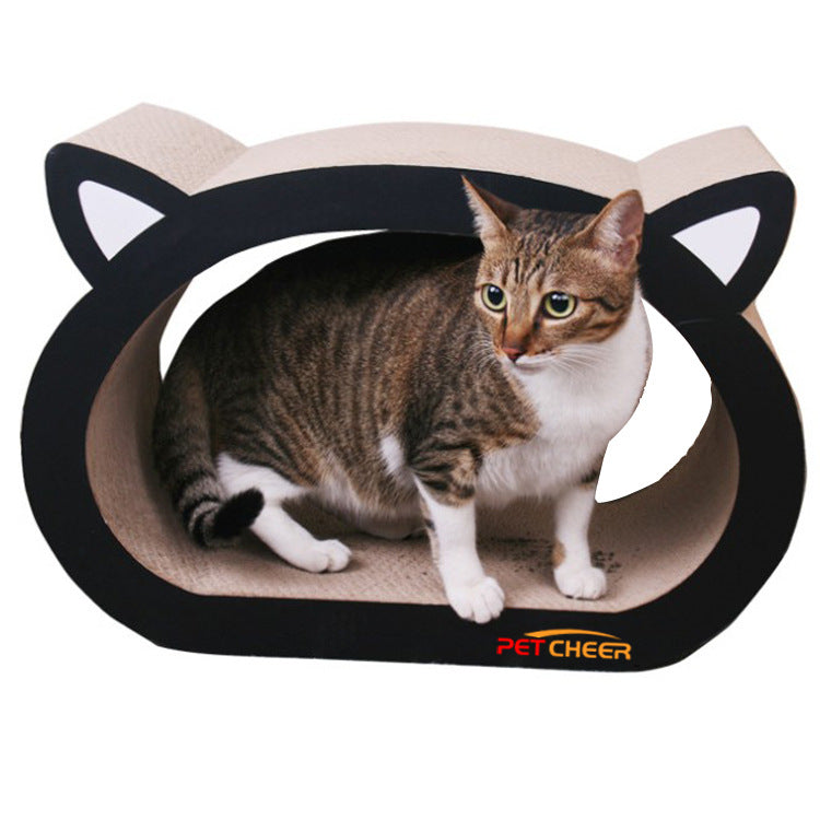 Cat sitting inside a black and beige cat-shaped cat scratcher with PETCHEER branding.