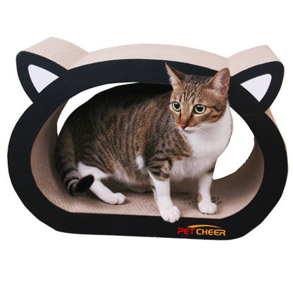 Cat sitting inside a black and beige cat-shaped cat scratcher with PETCHEER branding.